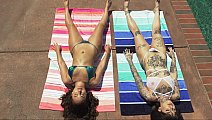 Badass brunette seducing busty babe by the pool